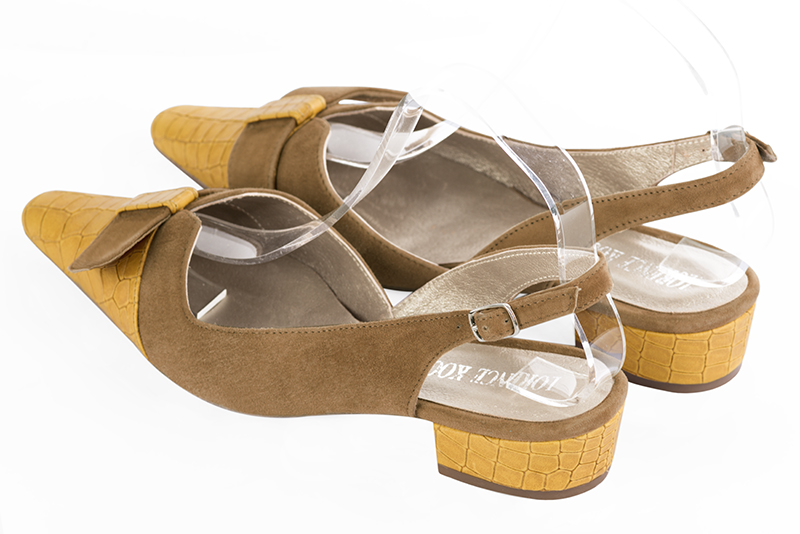 Mustard yellow and caramel brown women's open back shoes, with a knot. Tapered toe. Low block heels. Rear view - Florence KOOIJMAN